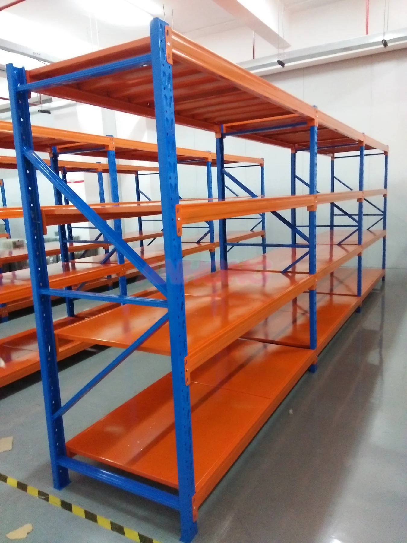 Orange and blue warehouse shelving rows
